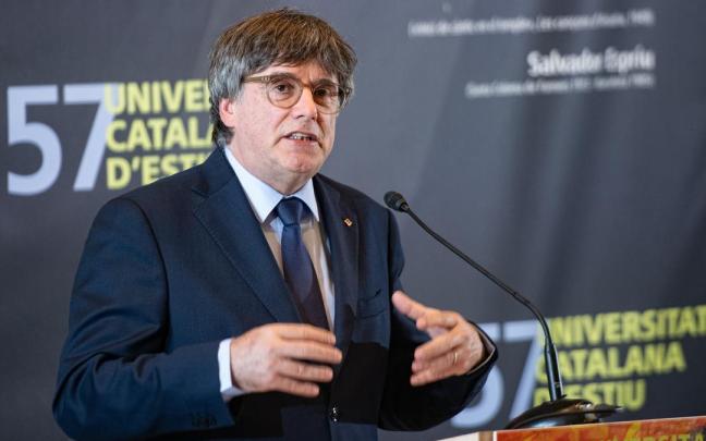 El presidente de Junts, Carles Puigdemont, interviene durante una conferencia