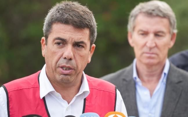 El presidente de la Generalitat Valenciana, Carlos Mazón (i) y el presidente del Partido Popular, Alberto Núñez Feijóo (d)
