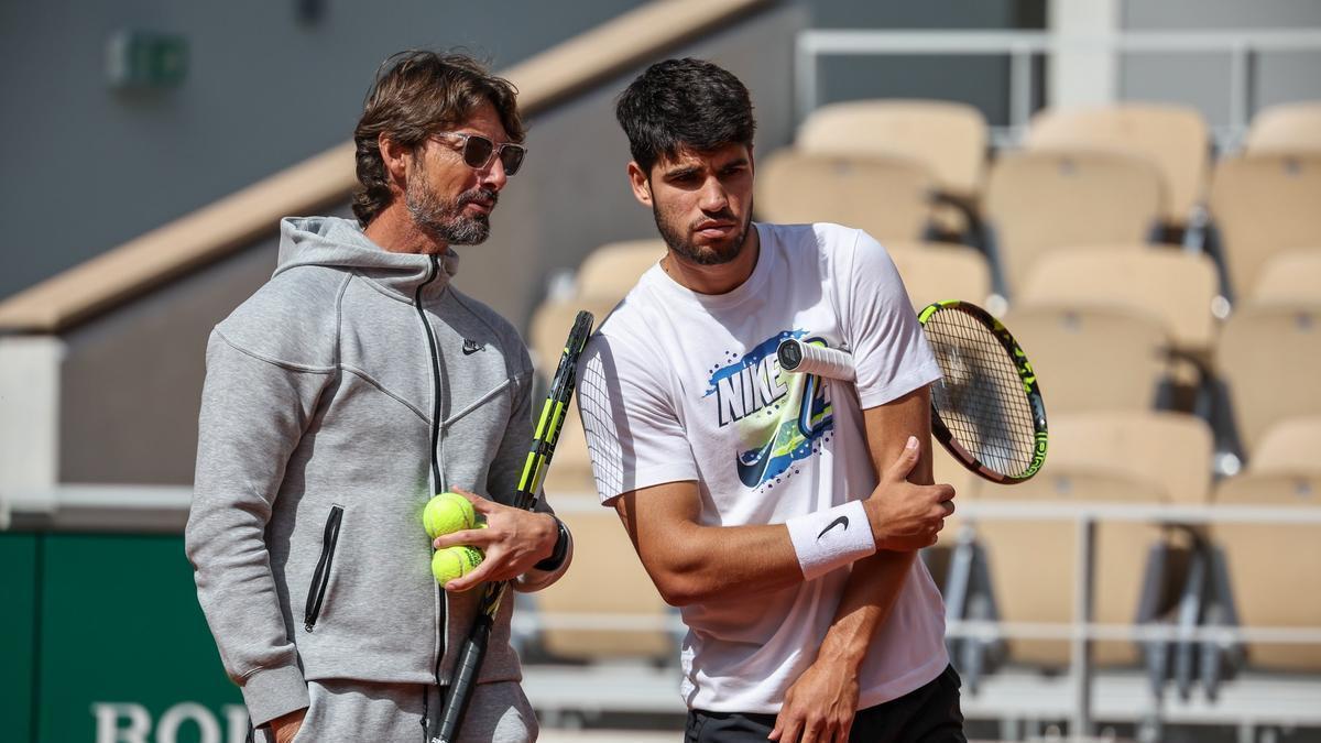 Juan Carlos Ferrero y Carlos Alcaraz, durante un entrenamiento.