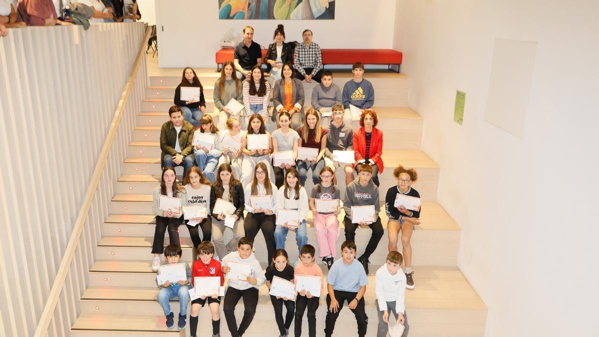 Los premiados, organizadores y miembros del jurado, en la tradicional foto de grupo