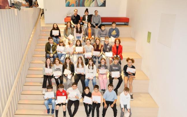 Los premiados, organizadores y miembros del jurado, en la tradicional foto de grupo