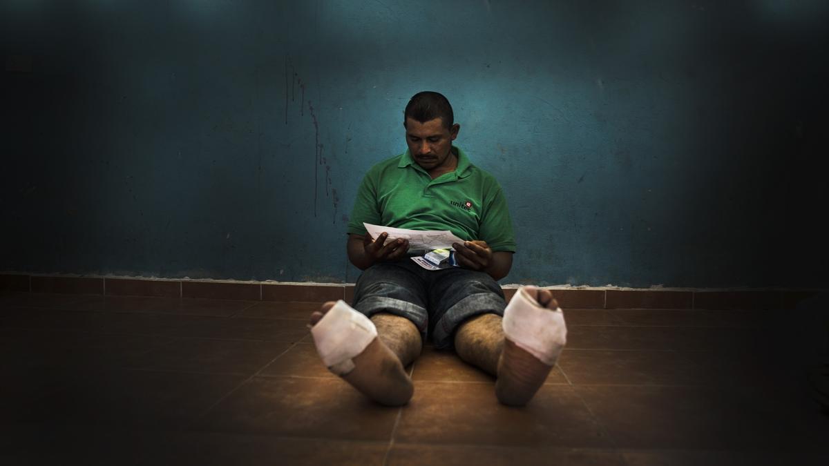 Imagen de archivo de una persona migrante en un albergue en México.