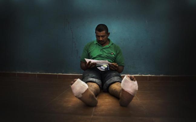 Imagen de archivo de una persona migrante en un albergue en México.