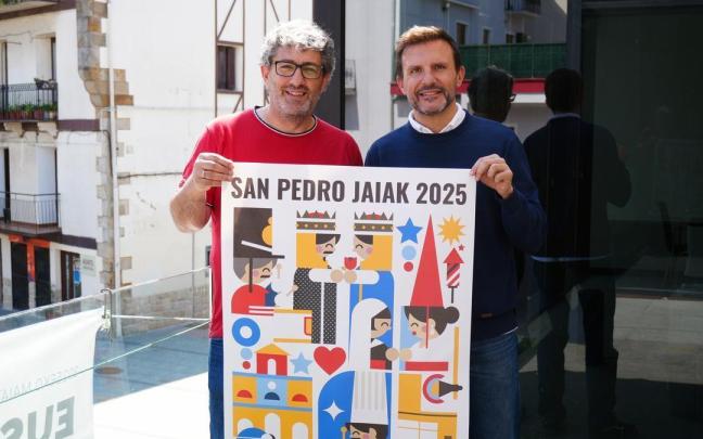 Txus Alonso y Agustín Valdivia con el cartel ganador / N.G. Txus Alonso y Agustín Valdivia con el cartel ganador