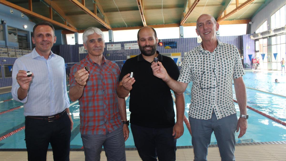 Presentación del sistema pionero, que ha dotado al recinto acuático cubierta de pantallas (al fondo) con monitorización a tiempo real.
