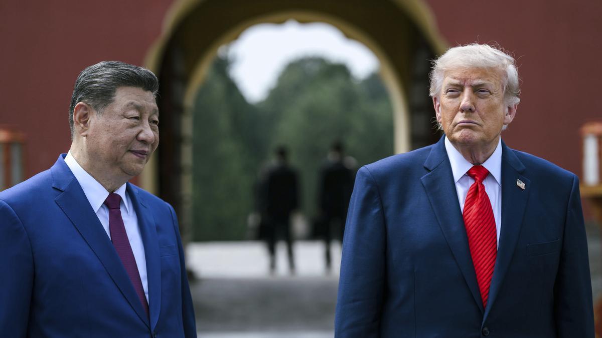 Trump, junto a Xi Jinping en su visita a China.