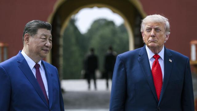 Trump, junto a Xi Jinping en su visita a China.