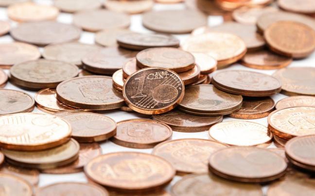 Varias monedas de un céntimo de euro. Varias monedas de un céntimo de euro.