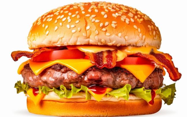 Una hamburguesa con queso, bacon, tomate y lechuga. Una hamburguesa con queso, bacon, tomate y lechuga.