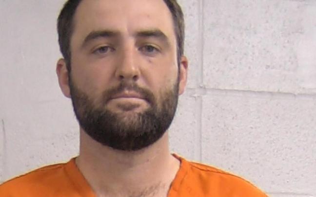 Scottie Scheffler tras ser detenido por la policía.