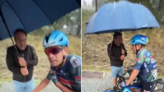 Mikel Landa terminó bajo el paraguas de un aficionado.