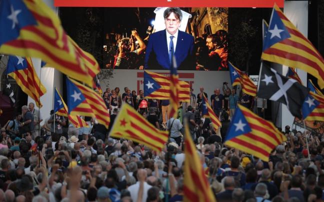 El expresident de la Generalitat, Carles Puigdemont, interviene por vía telemática en el acto por el 1 de octubre