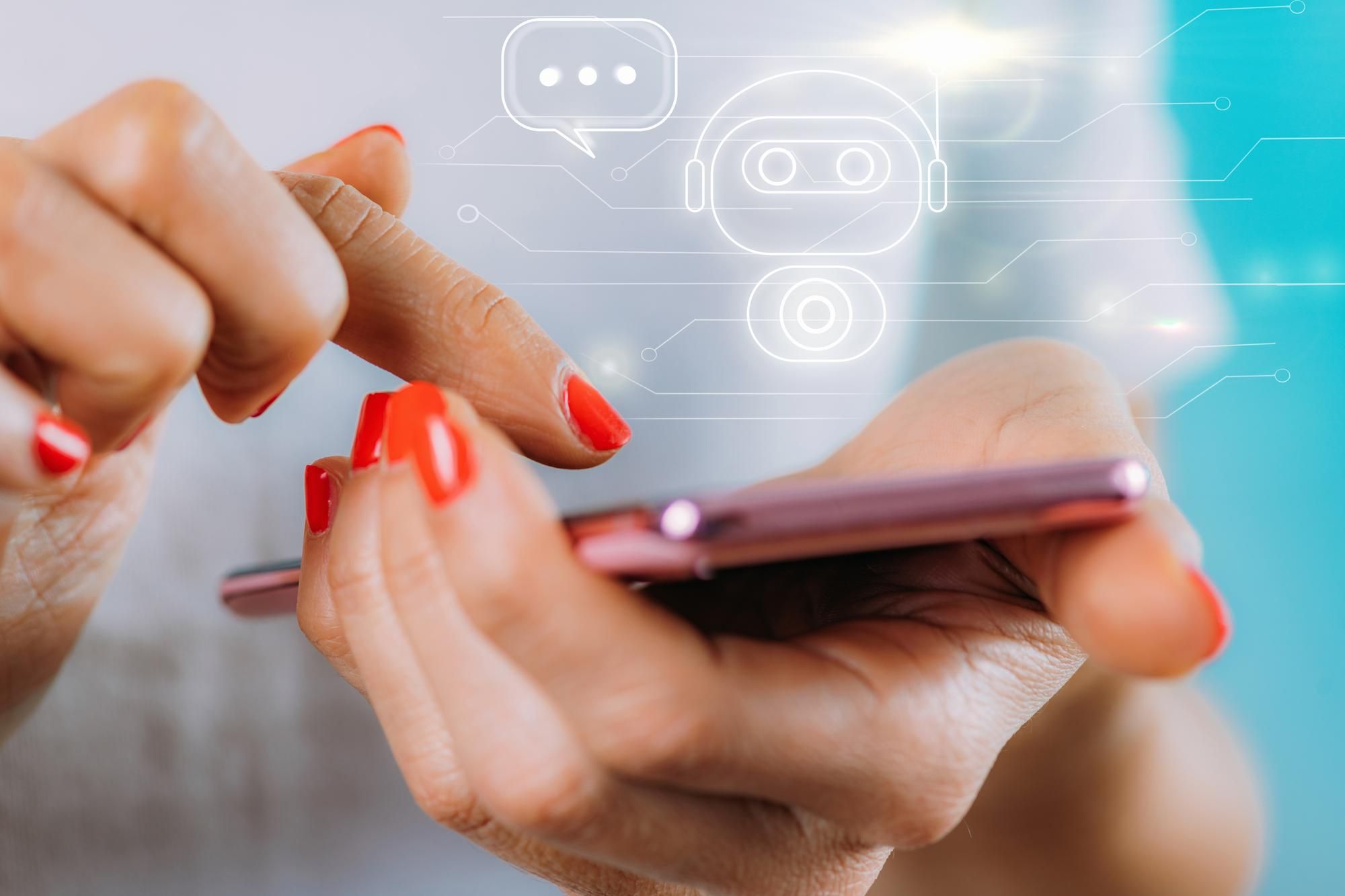 Una mujer dialoga con una IA a través de un chat.