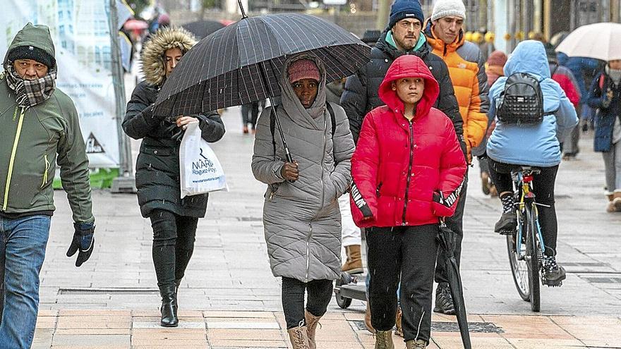 Con gorros y bufandas