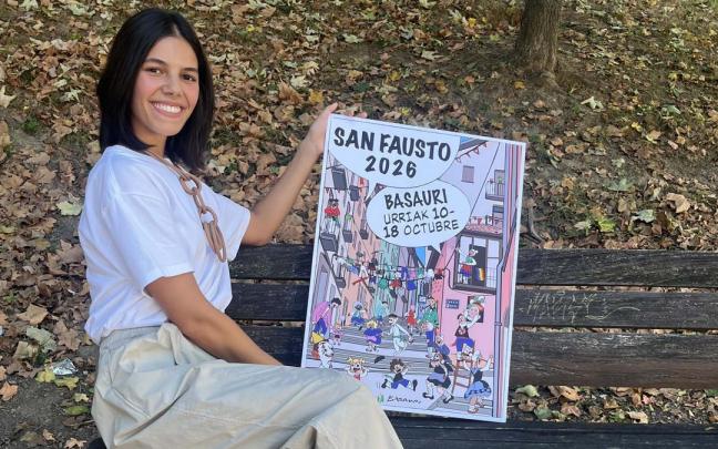Igone Aberasturi con el cartel ganador 'Denok Fauste kalera’