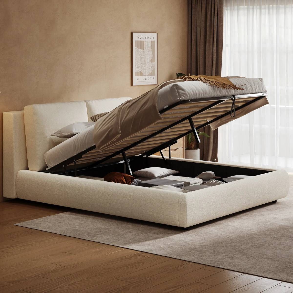 Cama con canapé abatible para almacenamiento.