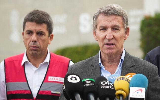 El presidente de la Generalitat Valenciana, Carlos Mazón (i) y el presidente del Partido Popular, Alberto Núñez Feijóo