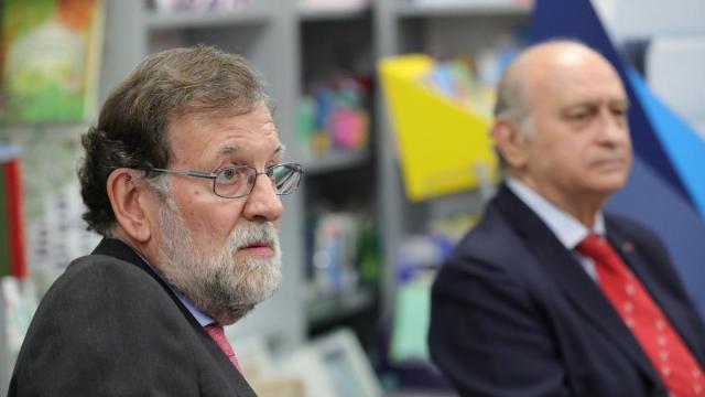 Mariano Rajoy, junto al exministro de Interior, Jorge Fernández Díaz, en una imagen de archivo.