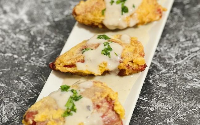Pimientos del piquillo rellenos de carne y hongos. / María Malo Pimientos del piquillo rellenos de carne y hongos.