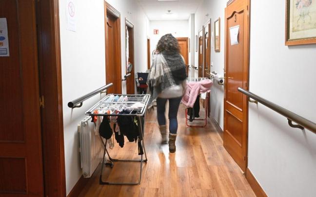 El pasillo, la cocina y la sala de estar de la vivienda. El pasillo, la cocina y la sala de estar de la vivienda.