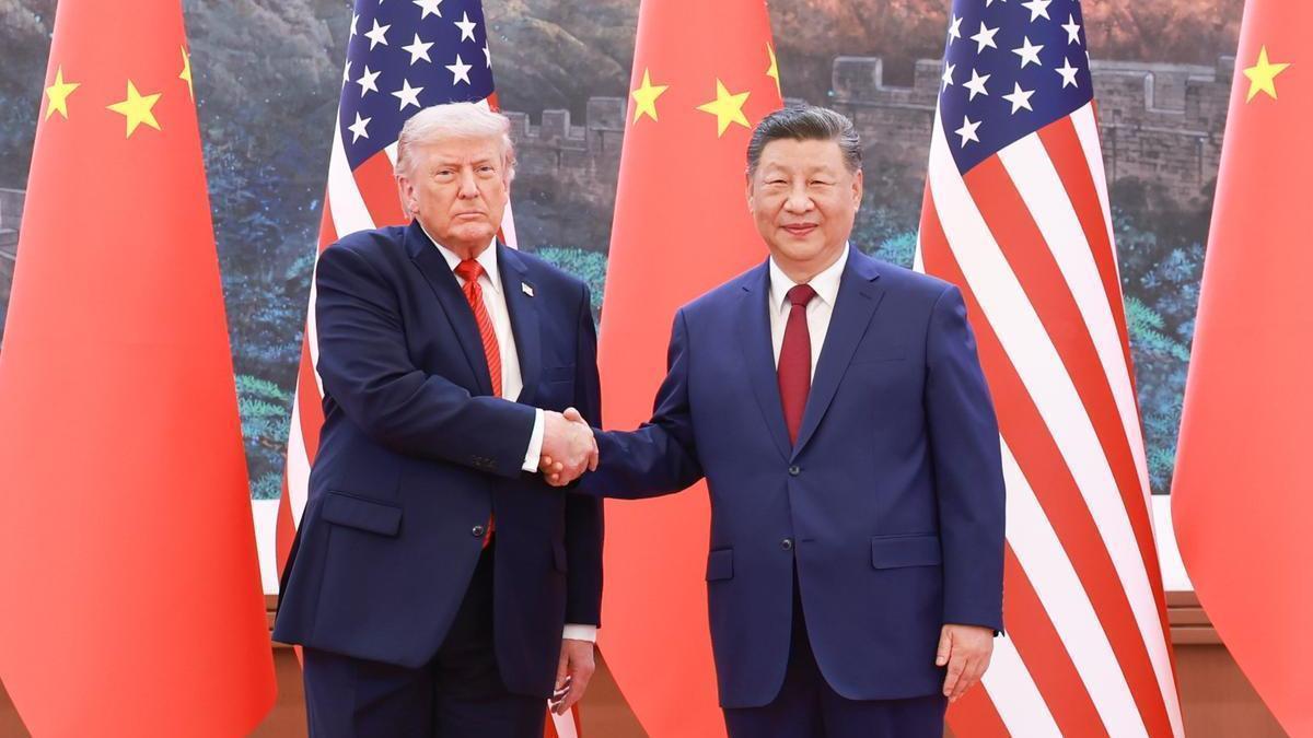 Donald Trump junto a Xi Jinping, este miércoles en Pekín.