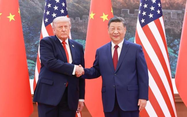 Donald Trump junto a Xi Jinping, este miércoles en Pekín.
