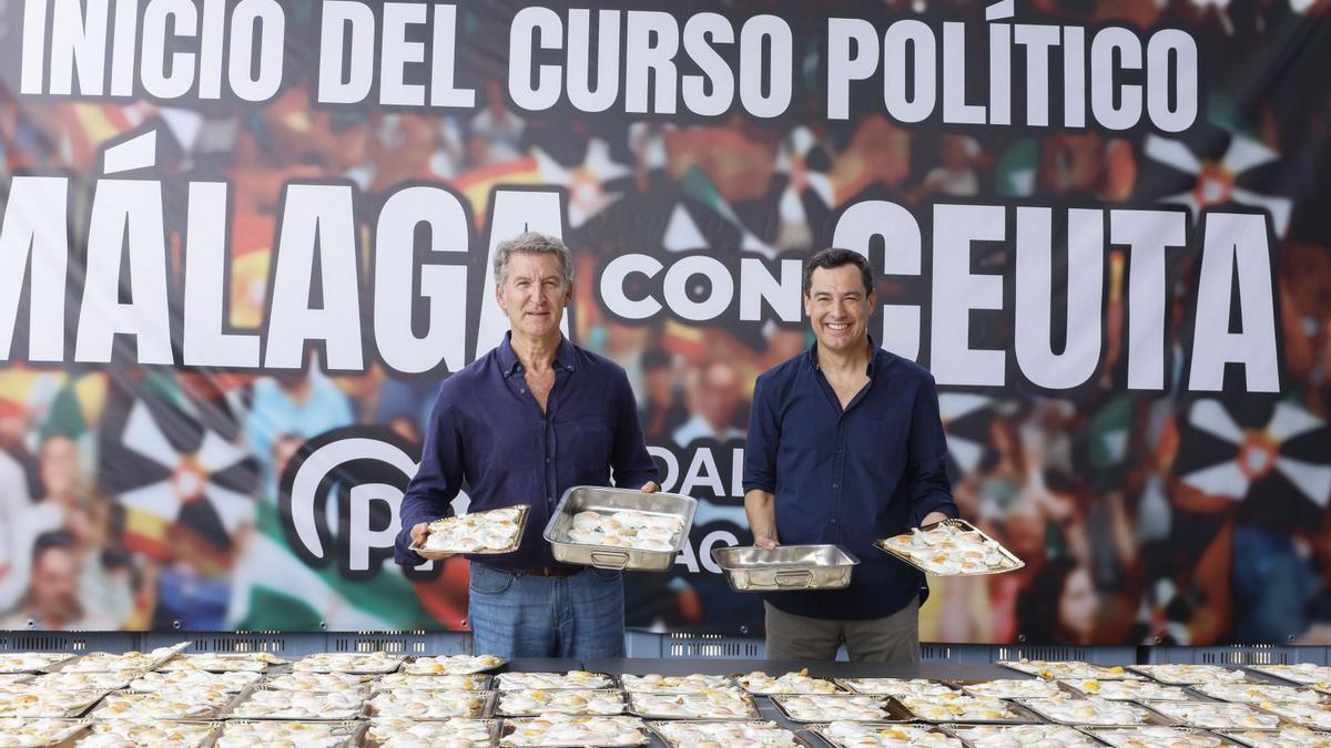 Alberto Núñez Feijóo y Juanma Moreno, en el inicio del curso político en Málaga.