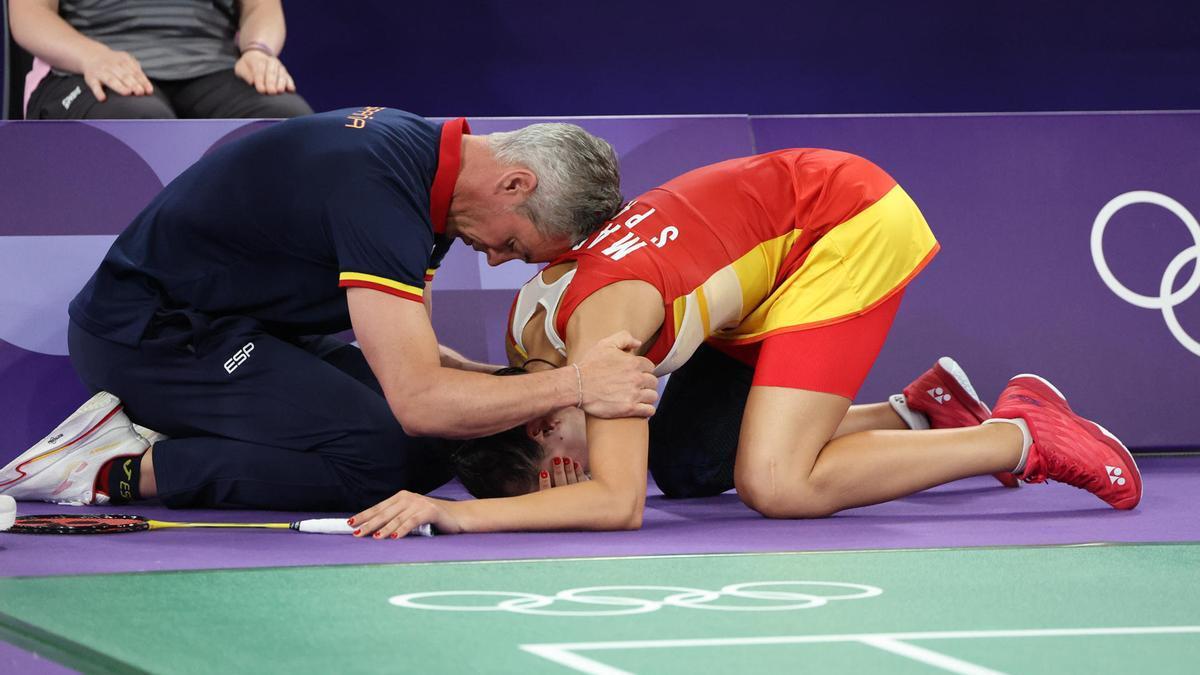 Carolina Marín junto a su entrenador