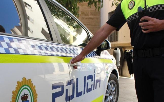 Imagen de un coche de la Policía. Imagen de un coche de la Policía.