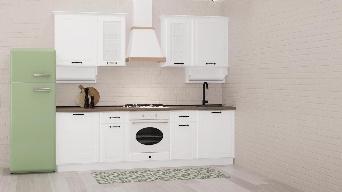 Cocina con una alfombra para proteger el suelo.