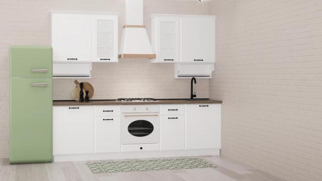 Cocina con una alfombra para proteger el suelo.