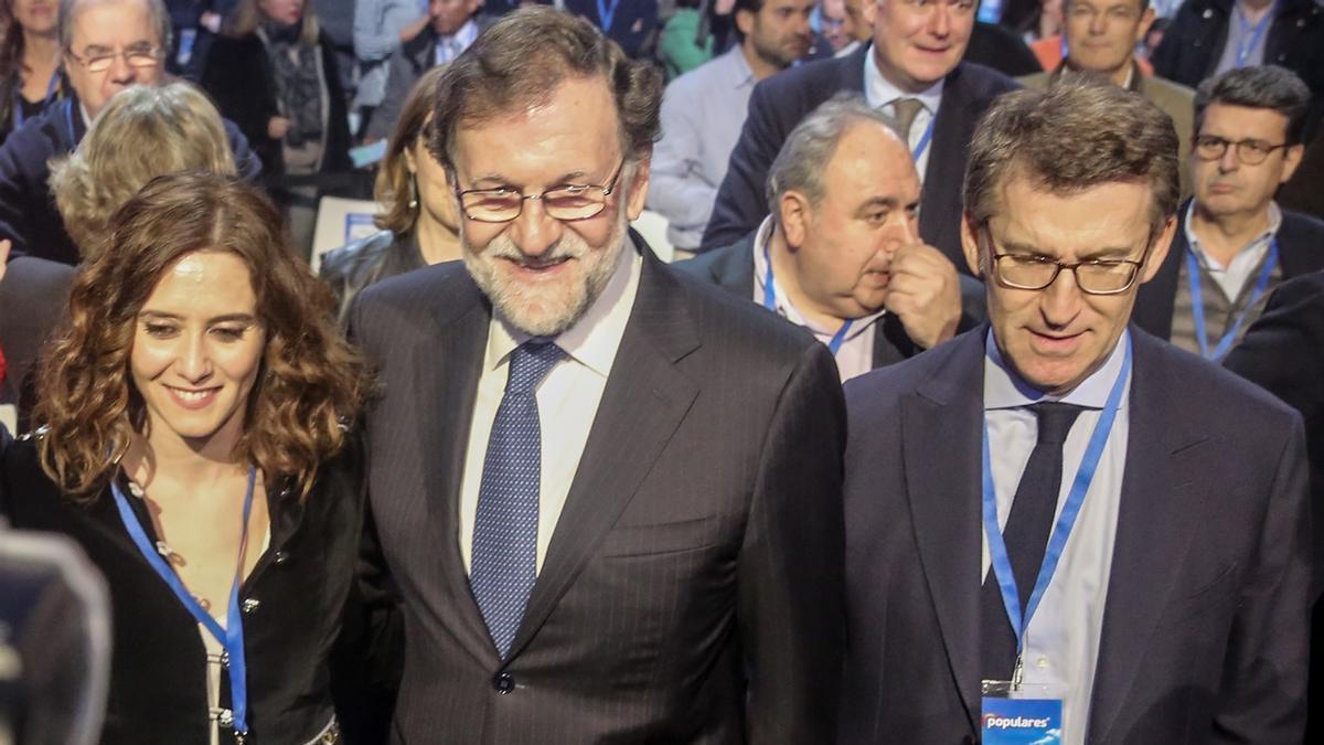 Rajoy, junto a Feijóo y Ayuso, en una imagen de archivo.