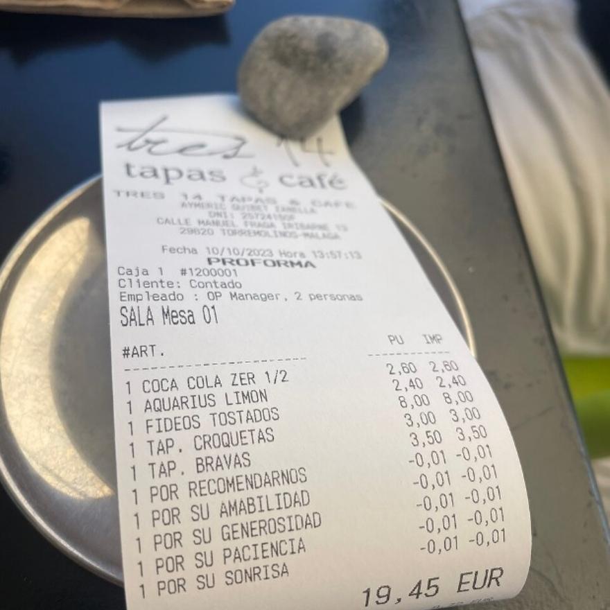 Un ticket del restaurante con los descuentos.