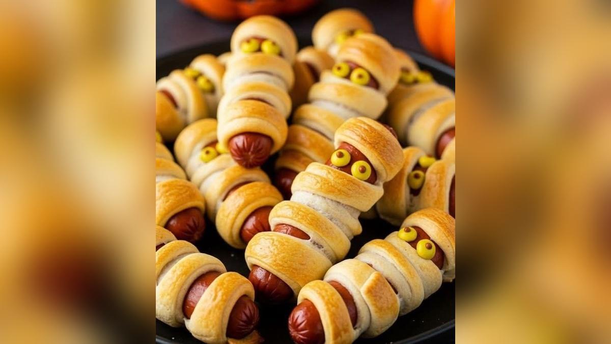 Momias de salchicha y hojaldre para el picoteo de Halloween.