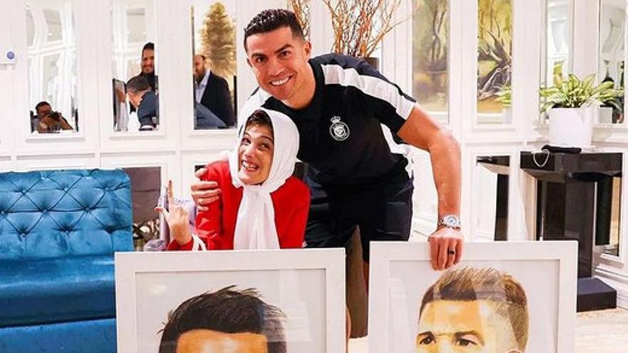Ronaldo junto a Fatemeh Hamami.