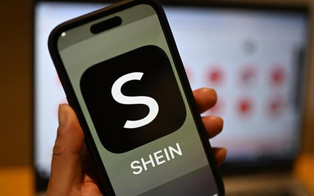 Logo de la empresa china Shein en un teléfono móvil. / EP Logo de la empresa china Shein en un teléfono móvil.