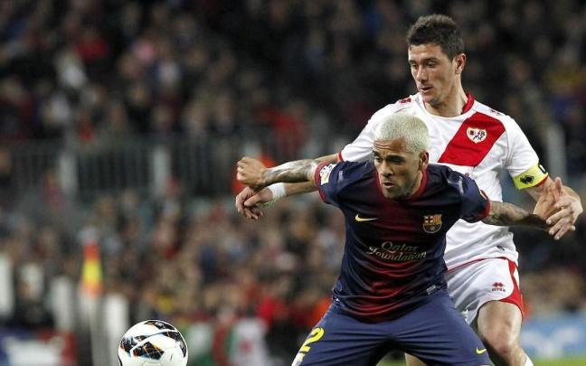 Piti, con Dani Alves, en su época en el Rayo, antes de rayar coches.