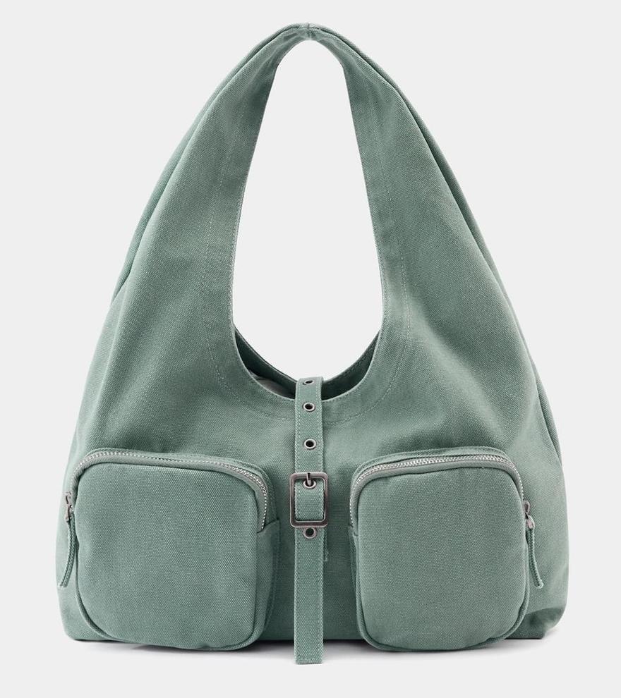 Original bolso de tela en color verde.