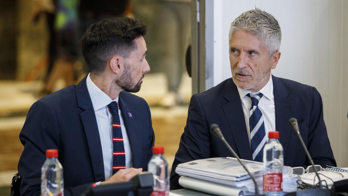 Rafael Pérez junto a Grande-Marlaska en un acto.