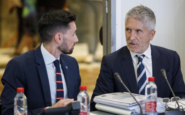 Rafael Pérez junto a Grande-Marlaska en un acto.