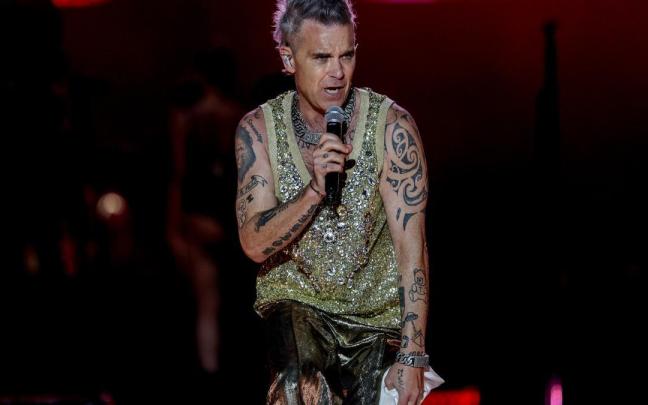 El cantante Robbie Williams durante una actuación. El cantante Robbie Williams durante una actuación.