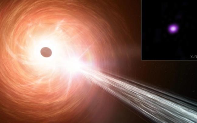 Concepto artístico de un agujero negro supermasivo, un disco circundante de material que cae hacia el agujero negro y un chorro que contiene partículas que se alejan a una velocidad cercana a la de la luz.