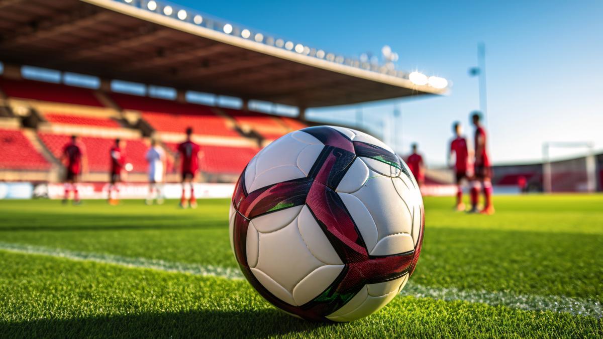 Futbolistas en un terreno de juego.