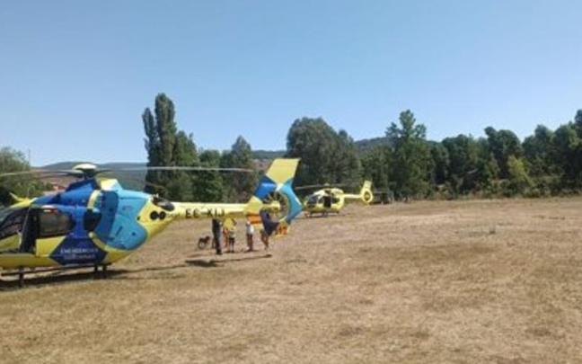 El helicóptero en el lugar donde se ha producido la caída del fallecido