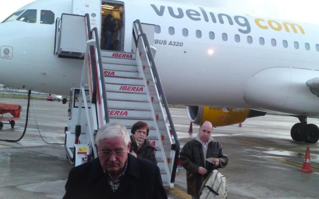 Pasajeros de un avión de Vueling. Pasajeros de un avión de Vueling.