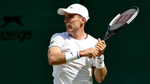 Bautista, durante el choque ante Fonseca en Wimbledon.