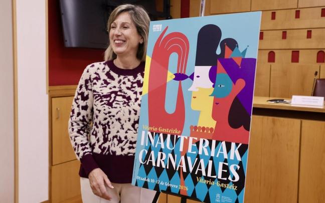 Díaz de Corcuera con el cartel anunciador del Carnaval de Vitoria de esta edición Pilar Barco