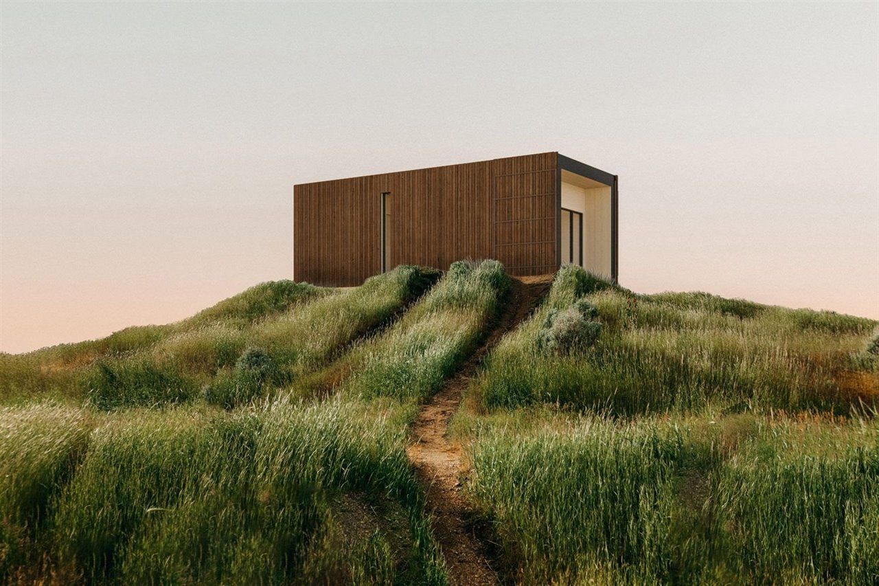 Casa prefabricada con cocina, baño y zona polivalente.
