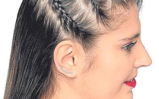Un peinado ladeado con trenzas.