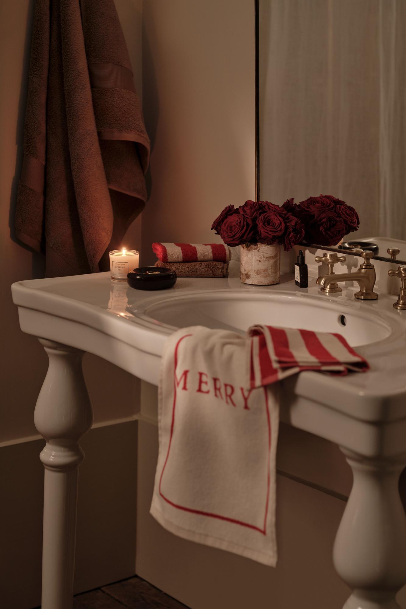 Toallas de baño con mensaje navideños.